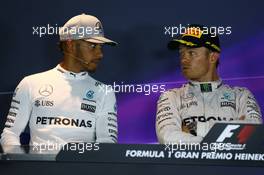Lewis Hamilton (GBR) Mercedes AMG F1 W07 and Nico Rosberg (GER) Mercedes AMG Petronas F1 W07 in the Press conference. 04.09.2016. Formula 1 World Championship, Rd 14, Italian Grand Prix, Monza, Italy, Race Day.