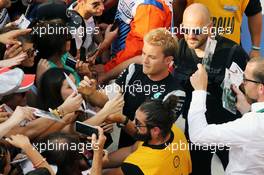 Nico Rosberg (GER) Mercedes AMG F1 signs autographs for the fans. 01.09.2016. Formula 1 World Championship, Rd 14, Italian Grand Prix, Monza, Italy, Preparation Day.
