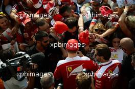 Kimi Raikkonen (FIN) Ferrari signs autographs for the fans. 01.09.2016. Formula 1 World Championship, Rd 14, Italian Grand Prix, Monza, Italy, Preparation Day.