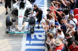 Mercedes AMG F1 W07 Hybrid of Lewis Hamilton (GBR) Mercedes AMG F1 pushed pass fans in the pits. 01.09.2016. Formula 1 World Championship, Rd 14, Italian Grand Prix, Monza, Italy, Preparation Day.