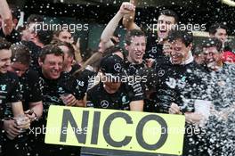 Race winner Nico Rosberg (GER) Mercedes AMG F1 celebrates the Constructors' title with Toto Wolff (GER) Mercedes AMG F1 Shareholder and Executive Director, and the team. 09.10.2016. Formula 1 World Championship, Rd 17, Japanese Grand Prix, Suzuka, Japan, Race Day.