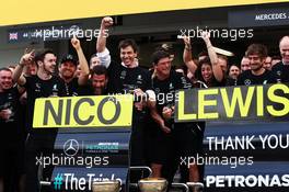 Toto Wolff (GER) Mercedes AMG F1 Shareholder and Executive Director celebrates winning the constructors' championship with race winner Nico Rosberg (GER) Mercedes AMG F1 and the team. 09.10.2016. Formula 1 World Championship, Rd 17, Japanese Grand Prix, Suzuka, Japan, Race Day.