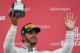 Lewis Hamilton (GBR) Mercedes AMG F1 celebrates his third position on the podium. 09.10.2016. Formula 1 World Championship, Rd 17, Japanese Grand Prix, Suzuka, Japan, Race Day.