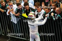 Lewis Hamilton (GBR) Mercedes AMG F1 celebrates his third position with the team in parc ferme. 09.10.2016. Formula 1 World Championship, Rd 17, Japanese Grand Prix, Suzuka, Japan, Race Day.