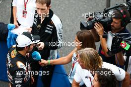 Sergio Perez (MEX) Sahara Force India F1 with the media. 08.10.2016. Formula 1 World Championship, Rd 17, Japanese Grand Prix, Suzuka, Japan, Qualifying Day.