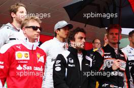 The drivers and HSH Prince Albert of Monaco (MON) as the grid observes the national anthem. 29.05.2015. Formula 1 World Championship, Rd 6, Monaco Grand Prix, Monte Carlo, Monaco, Race Day.