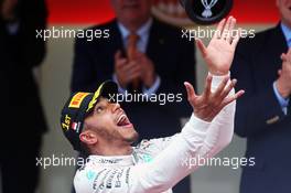 Race winner Lewis Hamilton (GBR) Mercedes AMG F1 celebrates on the podium. 29.05.2015. Formula 1 World Championship, Rd 6, Monaco Grand Prix, Monte Carlo, Monaco, Race Day.