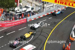 Daniil Kvyat (RUS) Scuderia Toro Rosso STR11 and Kevin Magnussen (DEN) Renault Sport F1 Team RS16 make contact. 29.05.2015. Formula 1 World Championship, Rd 6, Monaco Grand Prix, Monte Carlo, Monaco, Race Day.