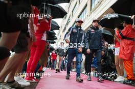 (L to R): Carlos Sainz Jr (ESP) Scuderia Toro Rosso with Max Verstappen (NLD) Red Bull Racing on the drivers parade. 29.05.2015. Formula 1 World Championship, Rd 6, Monaco Grand Prix, Monte Carlo, Monaco, Race Day.