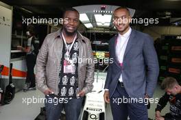 (L to R): Dominique Siby, Felio Siby CEO with Theo Walcott (GBR) Football Player, guests of the Sahara Force India F1 Team. 29.05.2015. Formula 1 World Championship, Rd 6, Monaco Grand Prix, Monte Carlo, Monaco, Race Day.