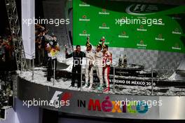 The podium (L to R): Tony Walton (GBR) Mercedes AMG F1 Mechanic; Nico Rosberg (GER) Mercedes AMG F1, second; Lewis Hamilton (GBR) Mercedes AMG F1, race winner; Sebastian Vettel (GER) Ferrari, third. 30.10.2016. Formula 1 World Championship, Rd 19, Mexican Grand Prix, Mexico City, Mexico, Race Day.