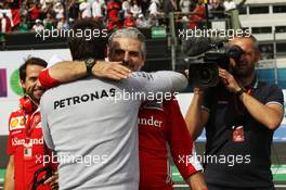 Maurizio Arrivabene (ITA) Ferrari Team Principal celebrates at the podium with Toto Wolff (GER) Mercedes AMG F1 Shareholder and Executive Director. 30.10.2016. Formula 1 World Championship, Rd 19, Mexican Grand Prix, Mexico City, Mexico, Race Day.