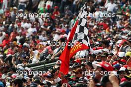 Ferrari flag with fans in the grandstand. 30.10.2016. Formula 1 World Championship, Rd 19, Mexican Grand Prix, Mexico City, Mexico, Race Day.