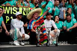 Race winner Lewis Hamilton (GBR) Mercedes AMG F1 and team mate Nico Rosberg (GER) Mercedes AMG F1 celebrate with the team. 30.10.2016. Formula 1 World Championship, Rd 19, Mexican Grand Prix, Mexico City, Mexico, Race Day.