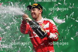Sebastian Vettel (GER) Ferrari celebrates his third position on the podium. 30.10.2016. Formula 1 World Championship, Rd 19, Mexican Grand Prix, Mexico City, Mexico, Race Day.