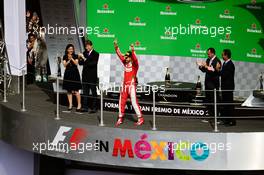 Sebastian Vettel (GER) Ferrari celebrates his third position on the podium. 30.10.2016. Formula 1 World Championship, Rd 19, Mexican Grand Prix, Mexico City, Mexico, Race Day.