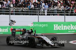 Sergio Perez (MEX) Sahara Force India F1 VJM09 waves to the crowd at the end of the race. 30.10.2016. Formula 1 World Championship, Rd 19, Mexican Grand Prix, Mexico City, Mexico, Race Day.