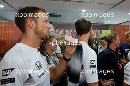 Jenson Button (GBR), McLaren Honda celebrates 300 GP. 30.09.2016. Formula 1 World Championship, Rd 16, Malaysian Grand Prix, Sepang, Malaysia, Friday.