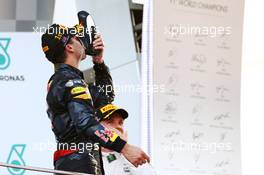Race winner Daniel Ricciardo (AUS) Red Bull Racing celebrates on the podium by drinking champagne from his race boot. 02.10.2016. Formula 1 World Championship, Rd 16, Malaysian Grand Prix, Sepang, Malaysia, Sunday.