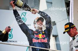 Race winner Daniel Ricciardo (AUS) Red Bull Racing celebrates on the podium with third placed Nico Rosberg (GER) Mercedes AMG F1. 02.10.2016. Formula 1 World Championship, Rd 16, Malaysian Grand Prix, Sepang, Malaysia, Sunday.