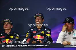 The post race FIA Press Conference (L to R): Max Verstappen (NLD) Red Bull Racing, second; Daniel Ricciardo (AUS) Red Bull Racing, race winner; Nico Rosberg (GER) Mercedes AMG F1, third. 02.10.2016. Formula 1 World Championship, Rd 16, Malaysian Grand Prix, Sepang, Malaysia, Sunday.