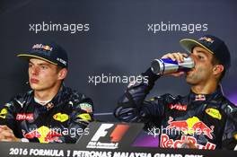 Race winner Daniel Ricciardo (AUS) Red Bull Racing (Right) in the FIA Press Conference with team mate Max Verstappen (NLD) Red Bull Racing. 02.10.2016. Formula 1 World Championship, Rd 16, Malaysian Grand Prix, Sepang, Malaysia, Sunday.