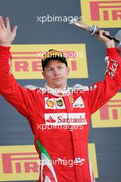 Kimi Raikkonen (FIN) Ferrari celebrates his third position on the podium. 01.05.2016. Formula 1 World Championship, Rd 4, Russian Grand Prix, Sochi Autodrom, Sochi, Russia, Race Day.