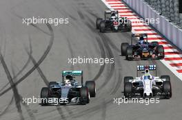Lewis Hamilton (GBR) Mercedes AMG F1 W07 Hybrid and Felipe Massa (BRA) Williams FW38 battle for position. 01.05.2016. Formula 1 World Championship, Rd 4, Russian Grand Prix, Sochi Autodrom, Sochi, Russia, Race Day.