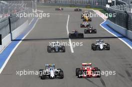 (L to R): Valtteri Bottas (FIN) Williams FW38 and Kimi Raikkonen (FIN) Ferrari SF16-H battle for position. 01.05.2016. Formula 1 World Championship, Rd 4, Russian Grand Prix, Sochi Autodrom, Sochi, Russia, Race Day.