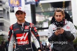 Esteban Gutierrez (MEX) Haas F1 Team with Sarah Dryhurst (GBR) Haas F1 Team Press Officer. 30.04.2016. Formula 1 World Championship, Rd 4, Russian Grand Prix, Sochi Autodrom, Sochi, Russia, Qualifying Day.