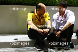 (L to R): Frederic Vasseur (FRA) Renault Sport F1 Team Racing Director with Toto Wolff (GER) Mercedes AMG F1 Shareholder and Executive Director. 16.09.2016. Formula 1 World Championship, Rd 15, Singapore Grand Prix, Marina Bay Street Circuit, Singapore, Practice Day.