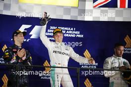 The podium (L to R): Daniel Ricciardo (AUS) Red Bull Racing, second; Nico Rosberg (GER) Mercedes AMG F1, race winner; Lewis Hamilton (GBR) Mercedes AMG F1, third. 18.09.2016. Formula 1 World Championship, Rd 15, Singapore Grand Prix, Marina Bay Street Circuit, Singapore, Race Day.