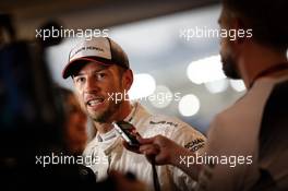 Jenson Button (GBR) McLaren with the media. 26.11.2016. Formula 1 World Championship, Rd 21, Abu Dhabi Grand Prix, Yas Marina Circuit, Abu Dhabi, Qualifying Day.