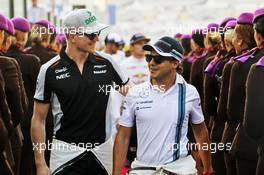 (L to R): Nico Hulkenberg (GER) Sahara Force India F1 with Felipe Massa (BRA) Williams on the drivers parade. 27.11.2016. Formula 1 World Championship, Rd 21, Abu Dhabi Grand Prix, Yas Marina Circuit, Abu Dhabi, Race Day.