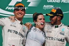 The podium (L to R): Nico Rosberg (GER) Mercedes AMG F1 with Victoria Vowles (GBR) Mercedes AMG F1 Partner Services Director and race winner Lewis Hamilton (GBR) Mercedes AMG F1. 23.10.2016. Formula 1 World Championship, Rd 18, United States Grand Prix, Austin, Texas, USA, Race Day.