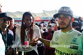 Lewis Hamilton (GBR) Mercedes AMG F1 with Venus Williams (USA) Tennis Player after the team celebration. 23.10.2016. Formula 1 World Championship, Rd 18, United States Grand Prix, Austin, Texas, USA, Race Day.