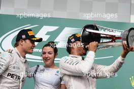 The podium (L to R): Nico Rosberg (GER) Mercedes AMG F1 with Victoria Vowles (GBR) Mercedes AMG F1 Partner Services Director and race winner Lewis Hamilton (GBR) Mercedes AMG F1. 23.10.2016. Formula 1 World Championship, Rd 18, United States Grand Prix, Austin, Texas, USA, Race Day.