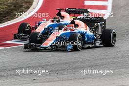 Esteban Ocon (FRA) Manor Racing MRT05 and team mate Pascal Wehrlein (GER) Manor Racing MRT05 battle for position. 23.10.2016. Formula 1 World Championship, Rd 18, United States Grand Prix, Austin, Texas, USA, Race Day.