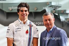 (L to R): Lance Stroll (CDN) Williams with Francois Dumontier, Montreal Circuit Promoter. 03.11.2016. Williams Driver Line-Up Announcement. Williams F1 Headquarters, Grove, England.