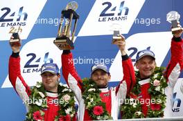 Podium GT-Pro: second place #82 Risi Competizione Ferrari 488 GTE: Giancarlo Fisichella, Toni Vilander, Matteo Malucelli.  19.06.2015. Le Mans 24 Hour, Race, Le Mans, France.