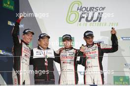(L to R): Race winners Stephane Sarrazin (FRA) /  Kamui Kobayashi (JPN) /  Mike Conway (GBR) #06 Toyota Gazoo Racing Toyota TS050 Hybrid, celebrate on the podium. 16.10.2016. FIA World Endurance Championship, Round 7, Six Hours of Fuji, Fuji, Japan, Sunday.