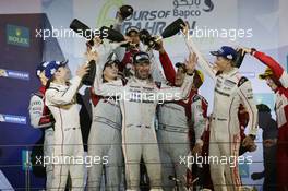 Mark Webber (AUS) #01 Porsche Team Porsche 919 Hybrid celebrates his third position and retirement on the podium. 19.11.2016. FIA World Endurance Championship, Round 9, Six Hours of Bahrain, Sakhir, Bahrain, Saturday