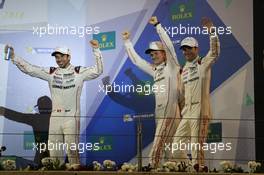 (L to R): Championship winners Neel Jani (SUI) / Marc Lieb (GER) / Romain Dumas (FRA) #02 Porsche Team Porsche 919 Hybrid, celebrate on the podium.  19.11.2016. FIA World Endurance Championship, Round 9, Six Hours of Bahrain, Sakhir, Bahrain, Saturday