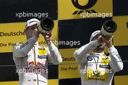Podium: Second place Marco Wittmann (GER) BMW Team RMG, BMW M4 DTM celebrates with the champagne with race winner Timo Glock (GER) BMW Team RMG, BMW M4 DTM. 19.08.2017, DTM Round 6, Circuit Zandvoort, Netherlands, Saturday.
