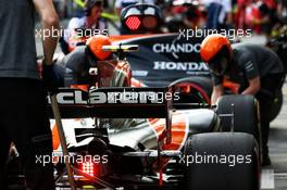 Stoffel Vandoorne (BEL) McLaren MCL32 and Fernando Alonso (ESP) McLaren MCL32 in the pits. 24.03.2017. Formula 1 World Championship, Rd 1, Australian Grand Prix, Albert Park, Melbourne, Australia, Practice Day.