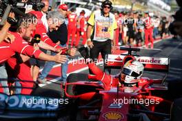 Race winner Sebastian Vettel (GER) Ferrari SF70H celebrates in parc ferme. 26.03.2017. Formula 1 World Championship, Rd 1, Australian Grand Prix, Albert Park, Melbourne, Australia, Race Day.