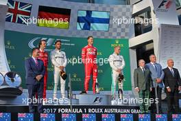 Lewis Hamilton (GBR) Mercedes AMG F1, Sebastian Vettel (GER) Scuderia Ferrari and Valtteri Bottas (FIN) Mercedes AMG F1  26.03.2017. Formula 1 World Championship, Rd 1, Australian Grand Prix, Albert Park, Melbourne, Australia, Race Day.