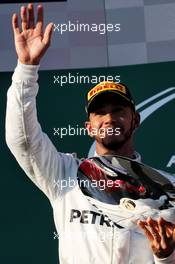 Lewis Hamilton (GBR) Mercedes AMG F1 celebrates his second position on the podium. 26.03.2017. Formula 1 World Championship, Rd 1, Australian Grand Prix, Albert Park, Melbourne, Australia, Race Day.