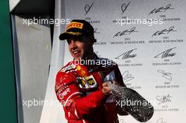 Race winner Sebastian Vettel (GER) Ferrari celebrates on the podium. 26.03.2017. Formula 1 World Championship, Rd 1, Australian Grand Prix, Albert Park, Melbourne, Australia, Race Day.