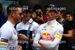 (L to R): Stoffel Vandoorne (BEL) McLaren with Max Verstappen (NLD) Red Bull Racing. 26.03.2017. Formula 1 World Championship, Rd 1, Australian Grand Prix, Albert Park, Melbourne, Australia, Race Day.